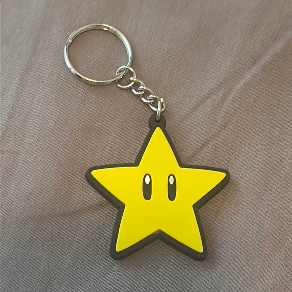 3/$30Nintendo Mario world Yellow Star Keychain